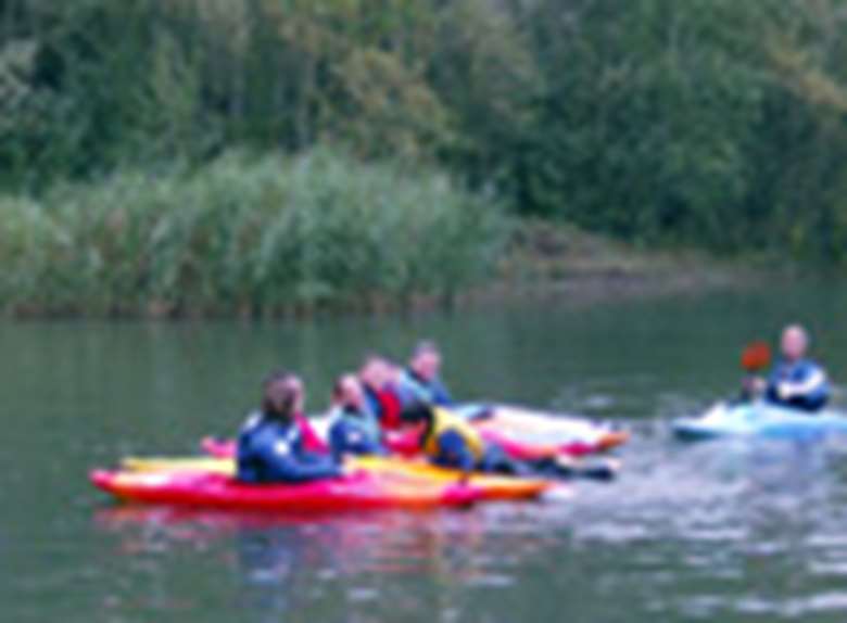 A group canoeing