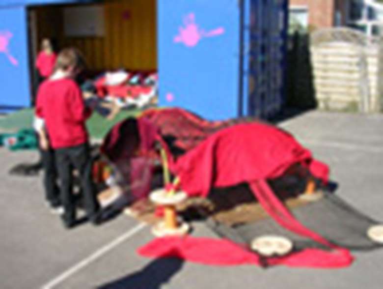 Children playing in containers. Credit: Children's Scrapstore