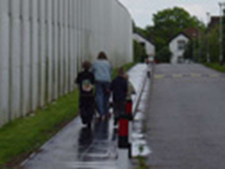 Family walking near a prison. Credit: Action for Prisoner's Families
