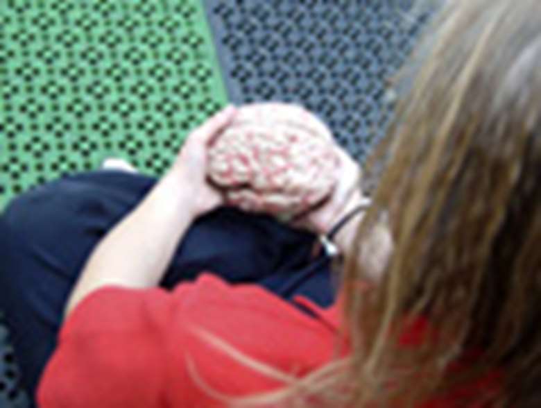 Girl holding a model brain