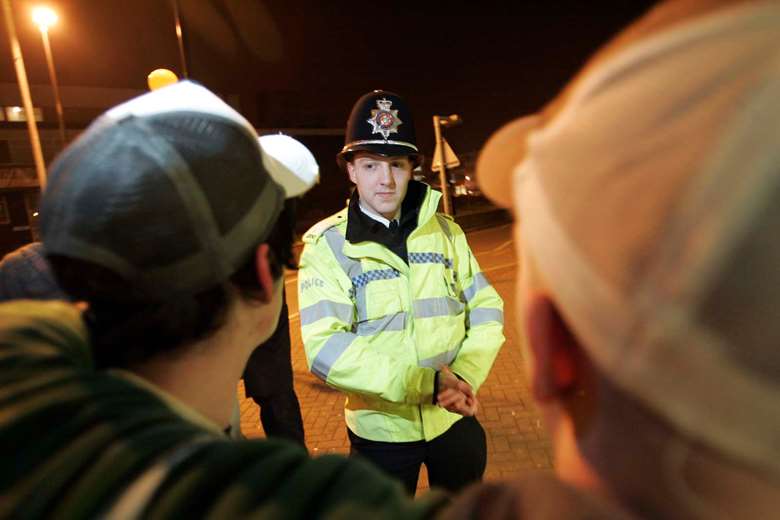 Youth offending team police officers undergo training on the job, and no special qualifications are required. Image: Robin Hammond/Icon