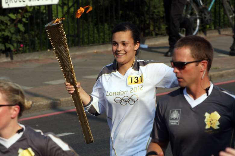Nancy Hammond carrying the Olympic Torch in 2012