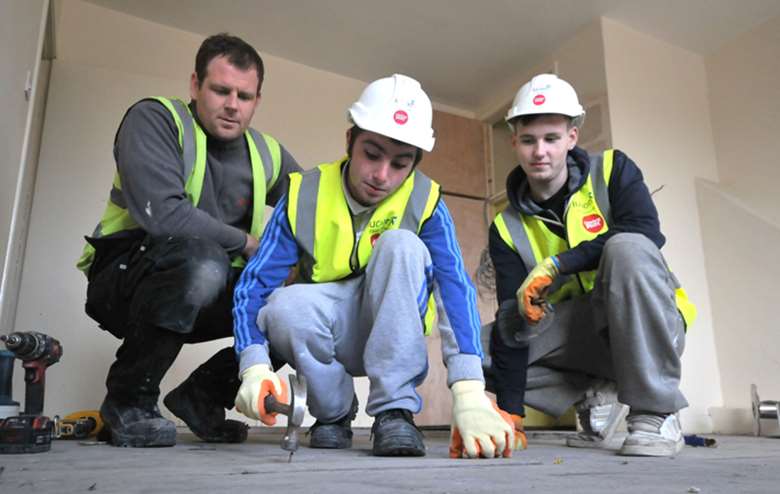 Young homeless people like Daniel and Nathan work with skilled tradesmen to renovate properties under an empty homes scheme in Sunderland. Picture: Tony Colling