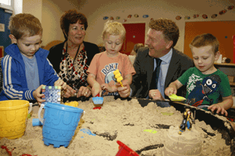 Southend-on-Sea Borough Council’s Elaine Hammans and Big Lottery Fund representative Jonathan Clark, with children at the Centre Place family centre