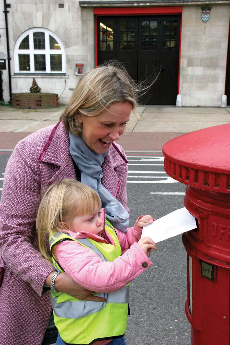 Encourage children to write letters to Santa and discuss the gifts they would like to give