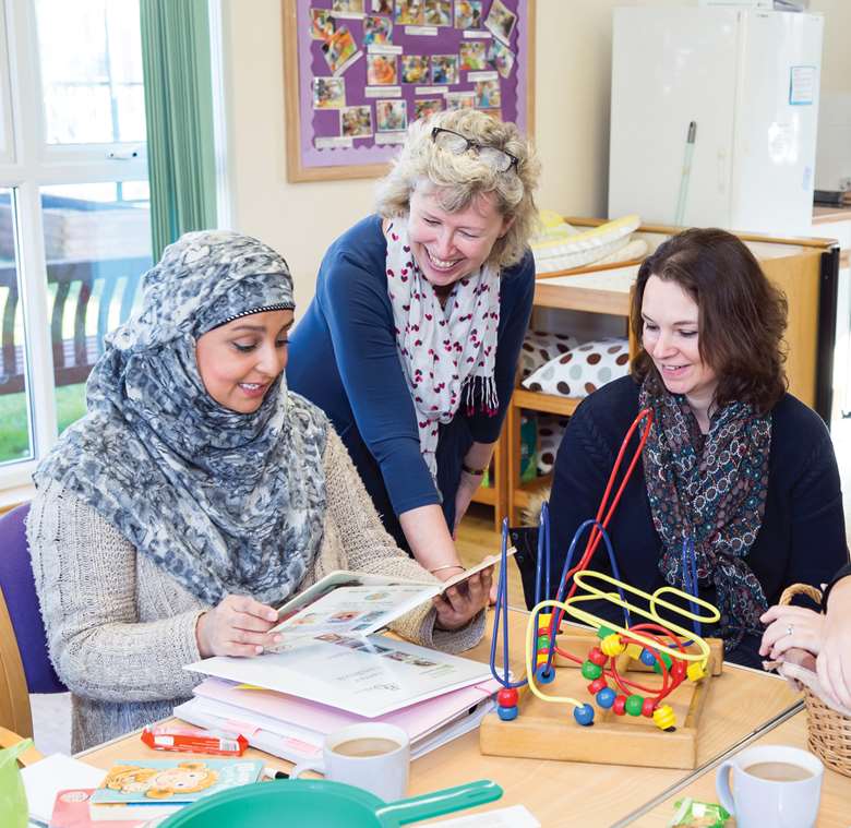 Parents Nagget Sultana and Karla Foreman discuss the work on the Accessing Better Childcare Pathway programme with tutor Alison Wallace (centre). Picture: Martin Bird