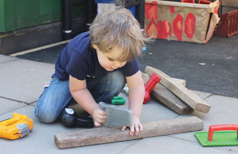 Children are free to use the well-equipped outdoor space at Sarratt Ducklings Pre-School
