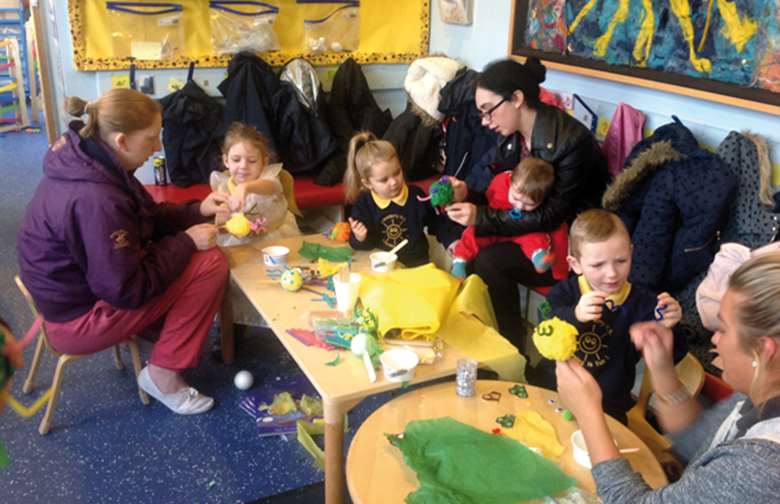 Parents take part in craft and music sessions to learn about activities they can do at home to support children’s early learning