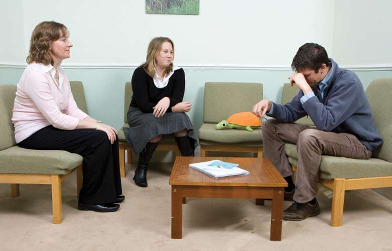 Family court advisers engage with parents. Picture: Peter Crane