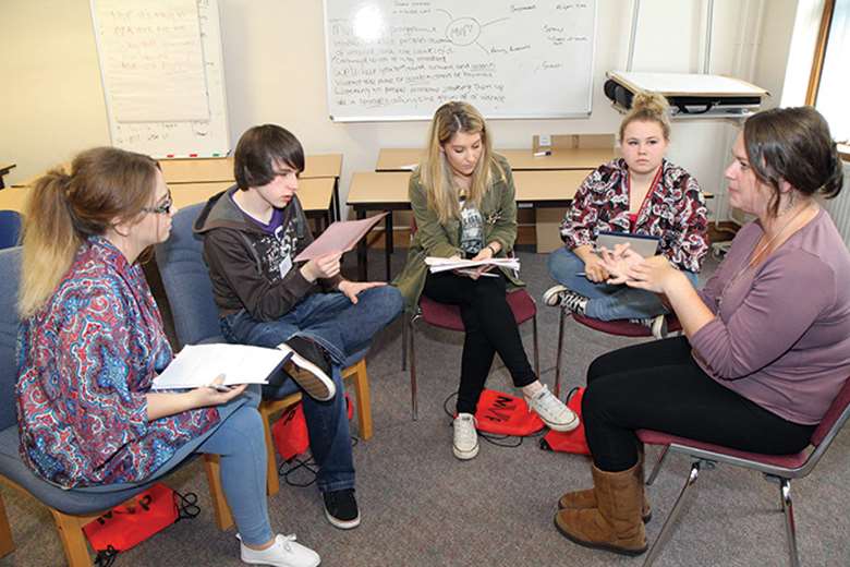 Mentors get training to lead discussions with younger pupils about the attitudes and cultural norms that underpin bullying