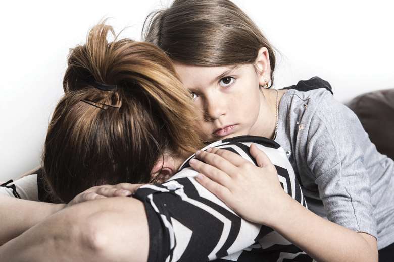 Caregivers can experience a number of challenges following the discovery of CSA. Picture: pololia/Adobe Stock/Posed by models