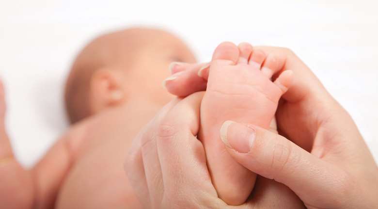 There is evidence infant massage can improve outcomes in low-birthweight babies. Picture: Cio18/Adobe Stock