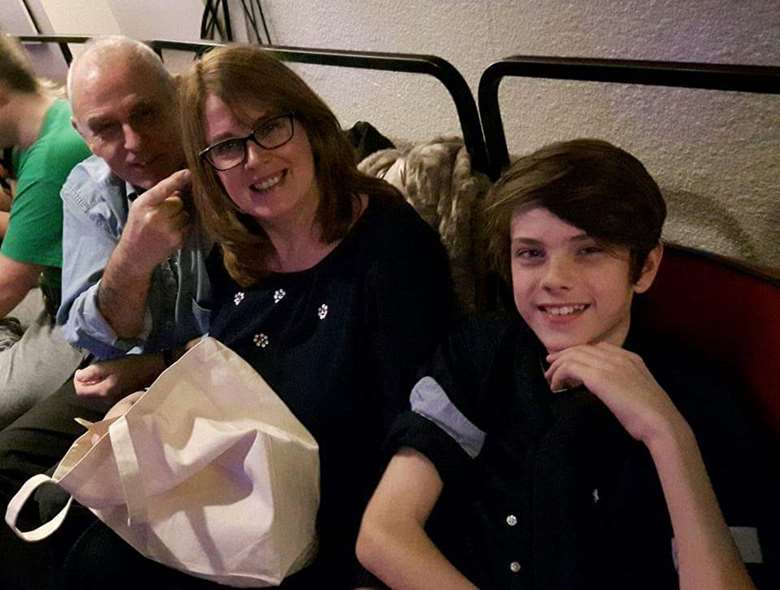Nico Heugh Simone, 15, pictured with his parents, claims his council has refused to meet the full cost of care to help him remain in mainstream school