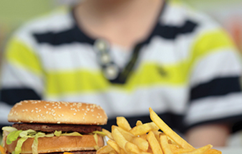 The report calls on government to consider banning the sale of fast food to children before 6pm on weekdays. Photo: Adobe Stock