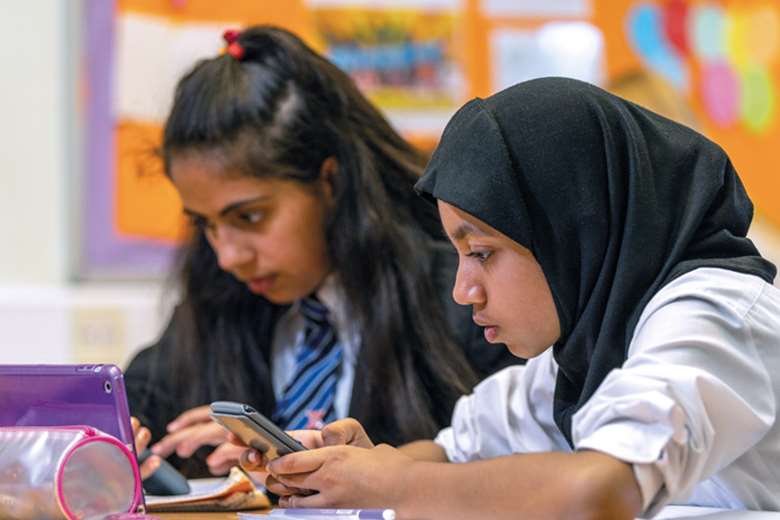 Digital devices in the classroom allow teachers at St James’ School to tailor lessons to the needs of individual pupils, helping to identify those in need of extra support. Picture: Sparx