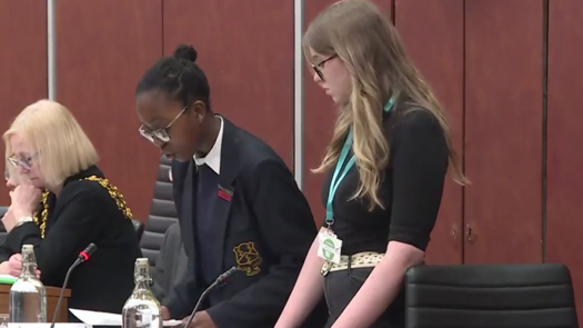 Young people from Oldham deliver a speech to councillors. Picture: Terry Galloway/Twitter