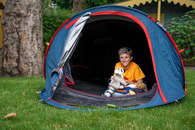 Max Woosey began sleeping in a tent to support his local hospice. Picture: Action for Children