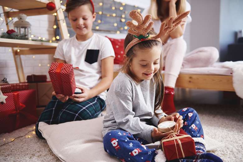 Explaining what a child might recieve as a gift ahead of time could ease any uncertainty, experts say. Picture: Adobe Stock