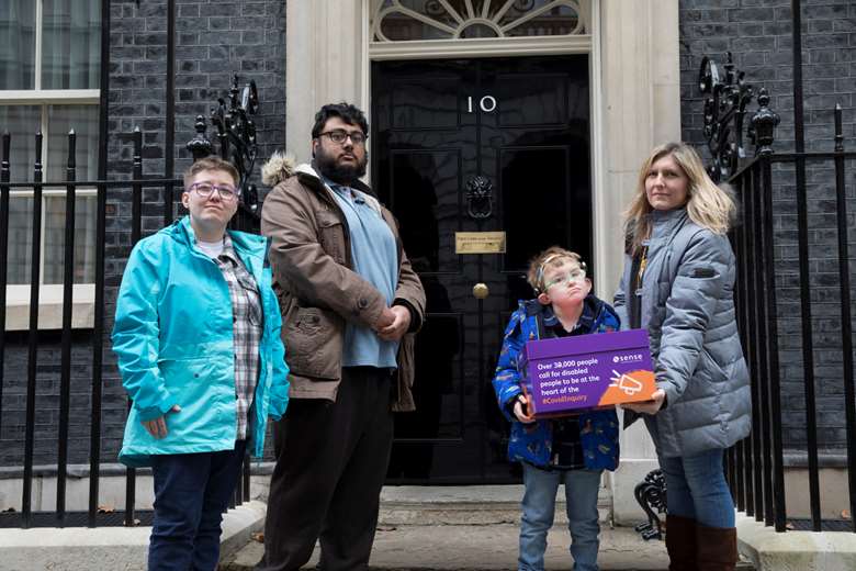 Campaigners deliver the petition to Downing Street. Picture: Sense