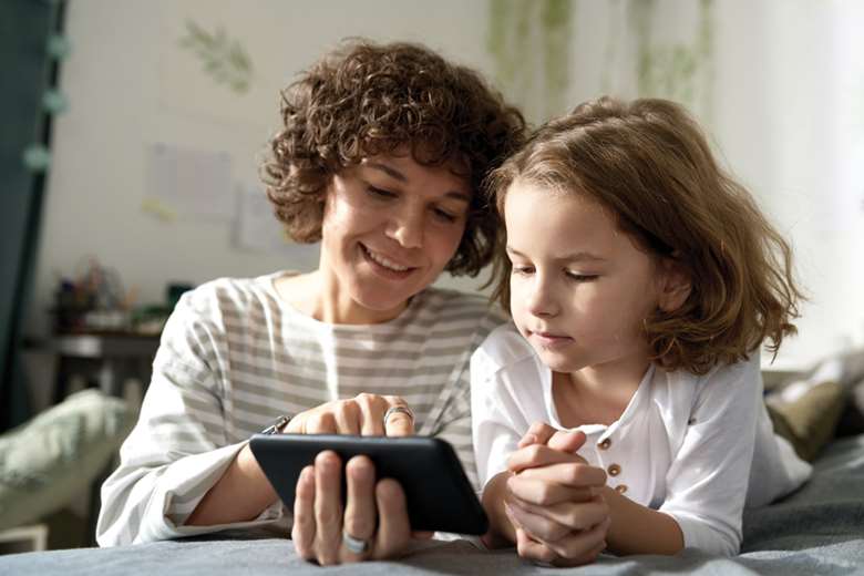 Ambassadors help parents and carers talk to their children about online safety. Picture: Mediaphotos/Adobe Stock