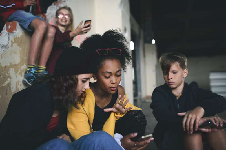 Social media has contributed to young people's exposure to violence, according to the report. Picture: Adobe Stock/ Halfpoint. 