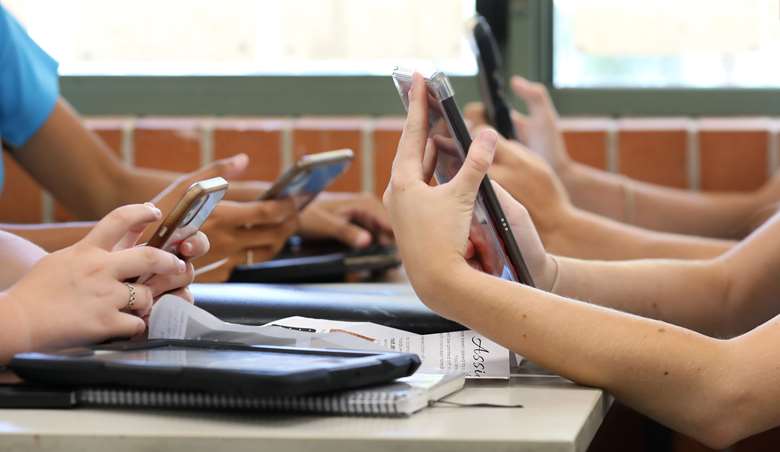 The guidance aims to tackle disruptive behaviour in schools linked to mobile phone use. Picture: Adobe Stock/ LincB