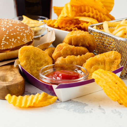 The ban on junk food adverts will come into force in April 2022. Picture: Adobe Stock