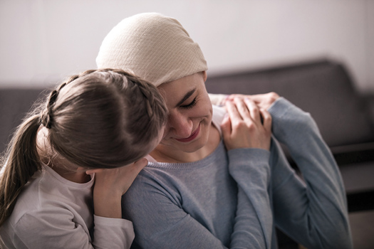 While at school, young people with caring responsibilities miss an average of 27 days per academic year. Picture: Lightfieldstudios/Adobe Stock