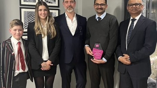 Members of St George's Auditory Implant Service (right) receive their award. Picture: AVUK