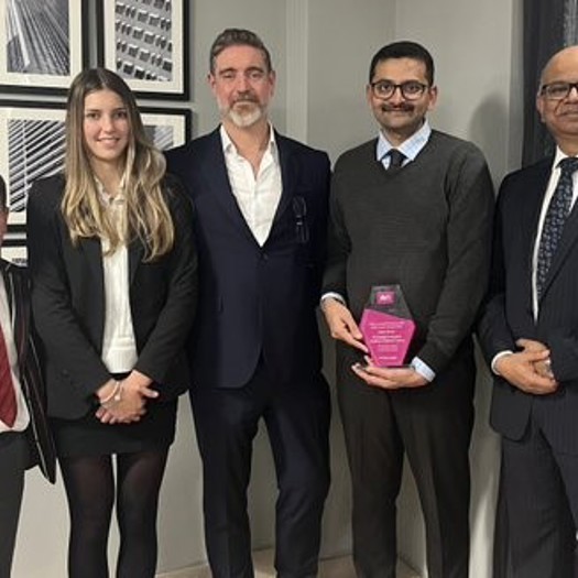 Members of St George's Auditory Implant Service (right) receive their award. Picture: AVUK