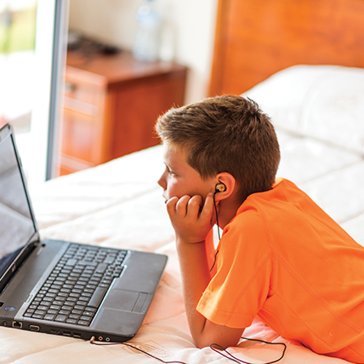 Schools have been told to update policies to include children working at home. Picture: Adobe Stock