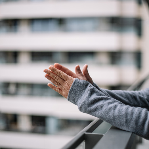 People took to their windows and doorsteps to Clap for Our Carers last night. Picture: Adobe Stock