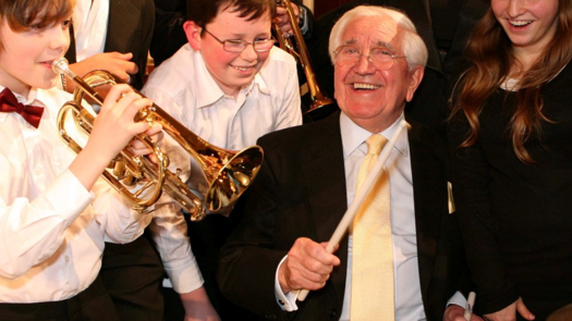 Jack Petchey (pictured centre) supported a range of youth causes. Picture: X/JPFoundation