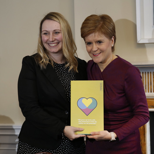 Nicola Sturgeon receives a copy of the review from co-chair of the review Laura Beveridge. Picture: Nicola Sturgeon