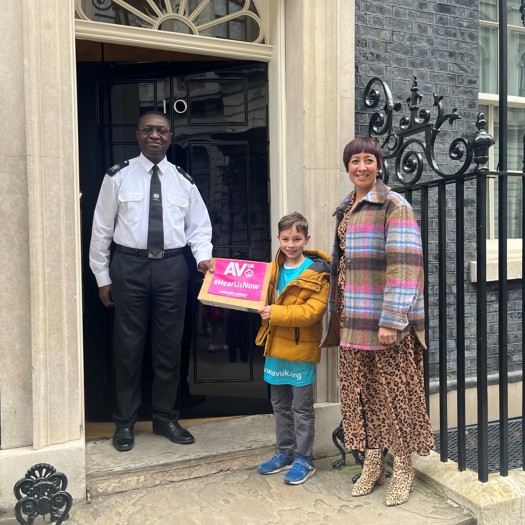 Orson Grimer visits Downing Street to deliver a campaign letter to the Prime Minister. Picture: Auditory Verbal UK