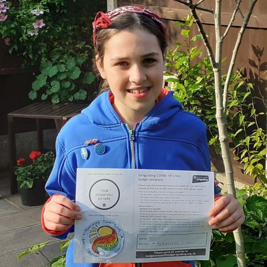 Guide Pippa, 12, designed a new badge celebrating Covid-19 key workers and volunteers. Picture: Girlguiding